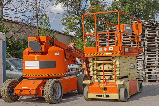 industrial forklift transporting goods in a warehouse setting in Manchester, MO